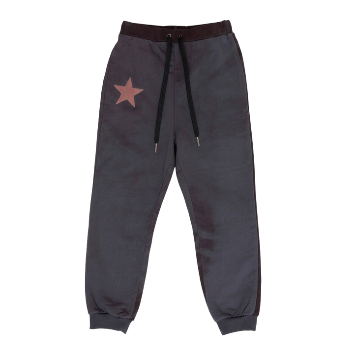 Dark gray jogger pants with a red star on a white background