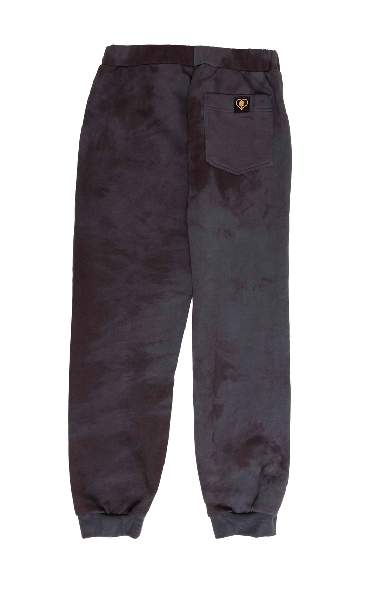 Dark gray pants with a brand logo on a white background