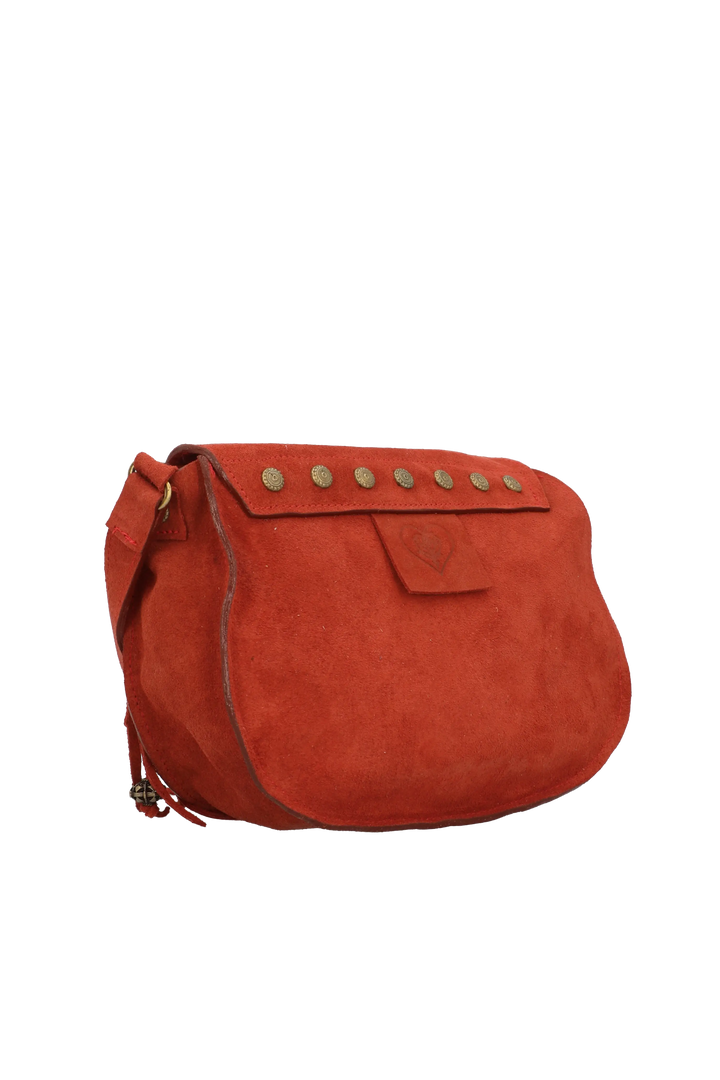 Red suede handbag with gold studs on a white background
