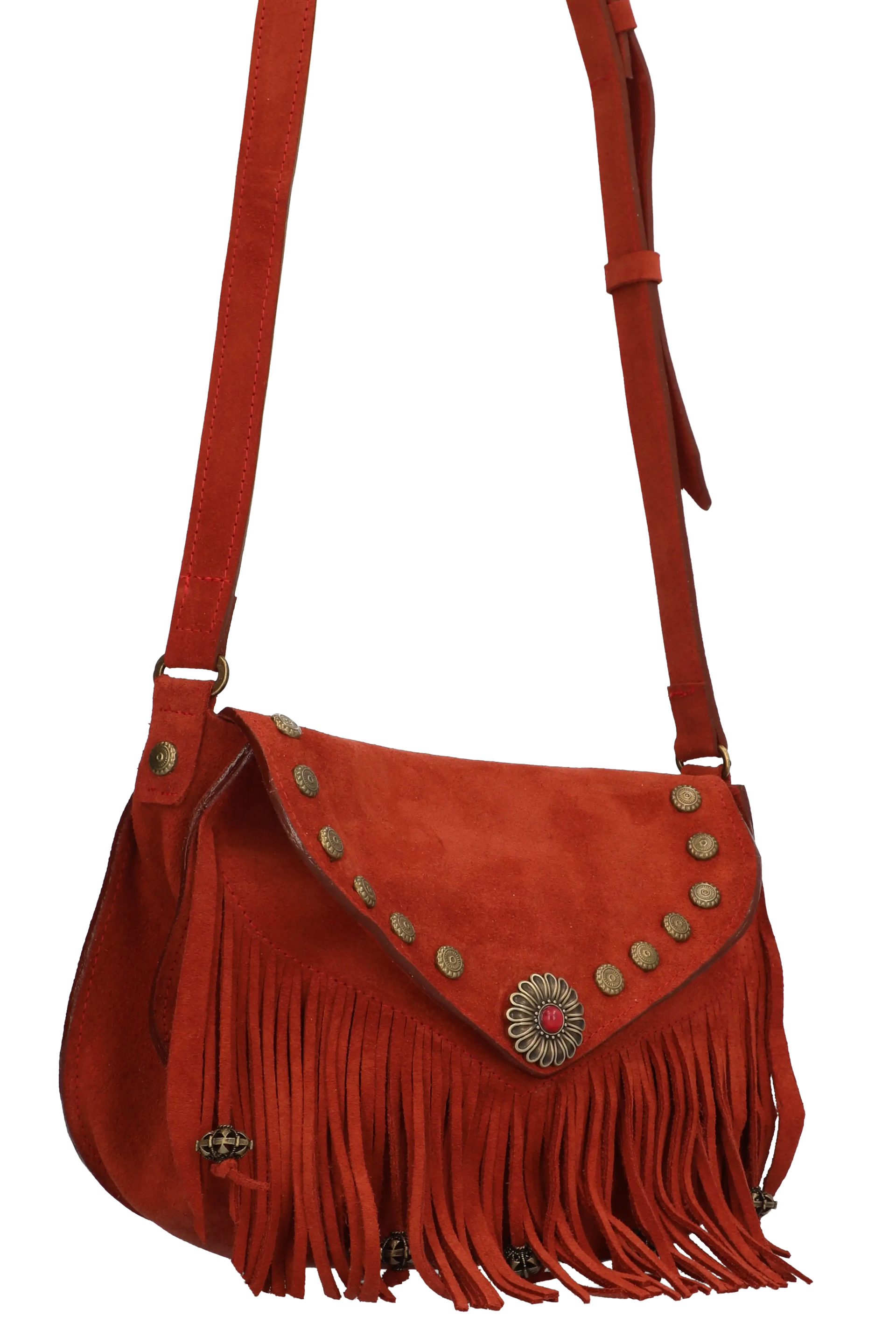 Red suede handbag with fringe and decorative stud details on a white background