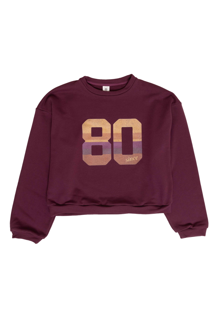 Maroon sweatshirt with '80 since' print on a white background