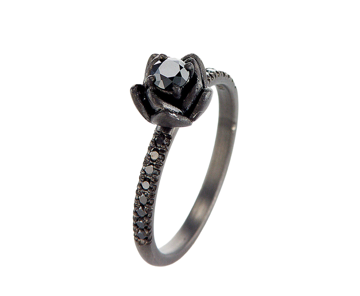 Black diamond ring on a white background