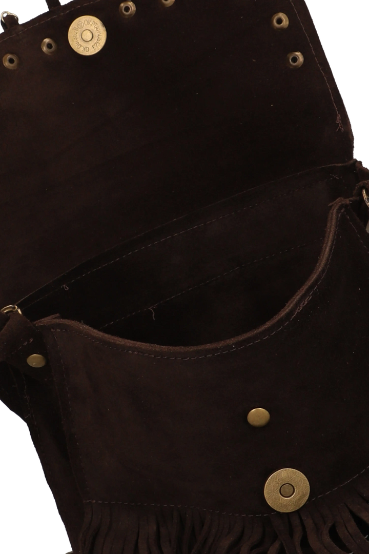 Close-up of a dark brown leather bag with gold studs on a white background