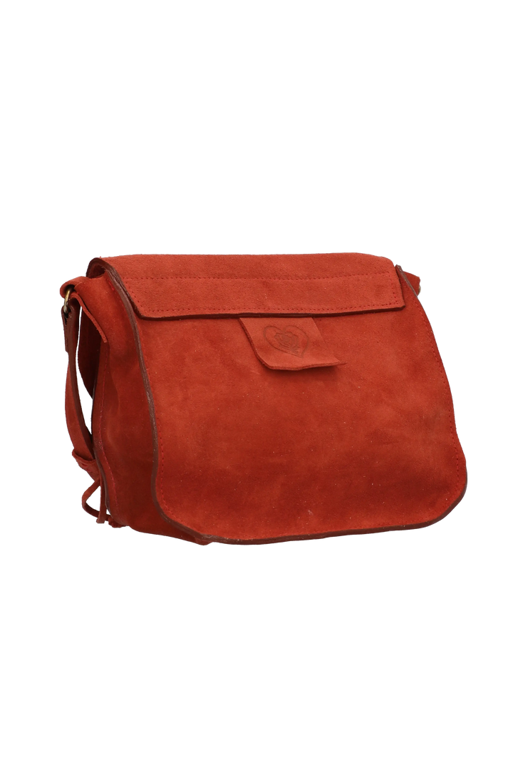 Red suede handbag on a white background