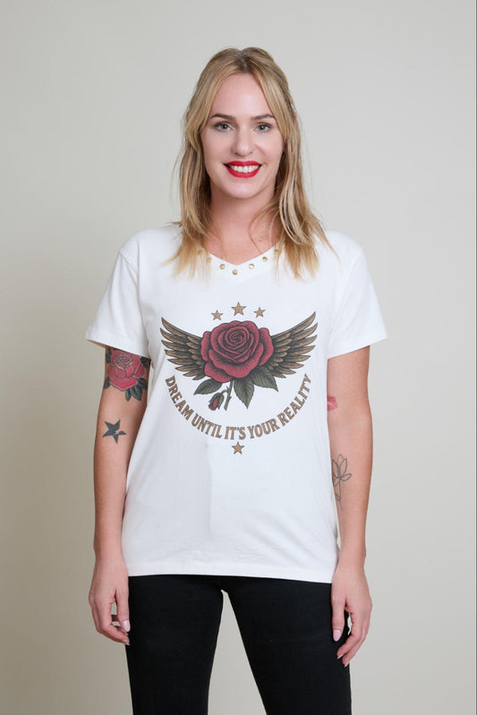 Woman wearing a white t-shirt with a graphic design and text on a plain background