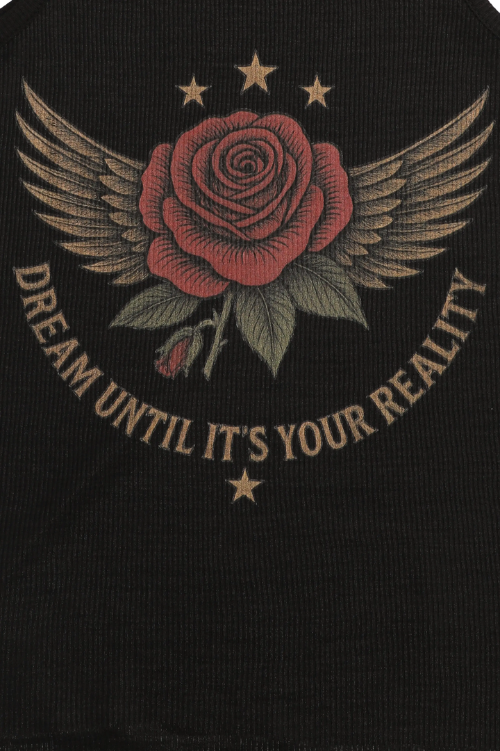 Black shirt with a red rose with wings and stars, and 'Dream Until It's Your Reality' text.